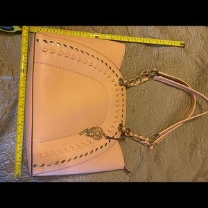 Jessica Simpson handbag color is a peach
